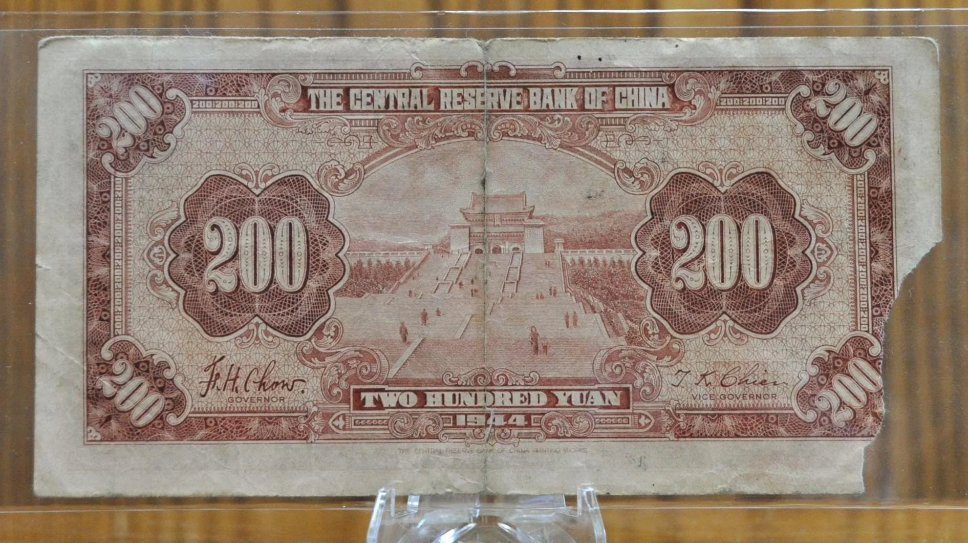 1944 Central Reserve Bank of China 200 Yuan Note - Corner Tear - Sun Yat-Sen Issue - 1944 Chinese Two Hundred Yuan Bank Note - P#J30 - Image 2
